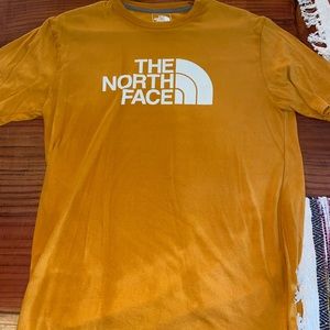 Men’s TheNorthFace Golden colored T-shirt - shadow makes shirt look discolored